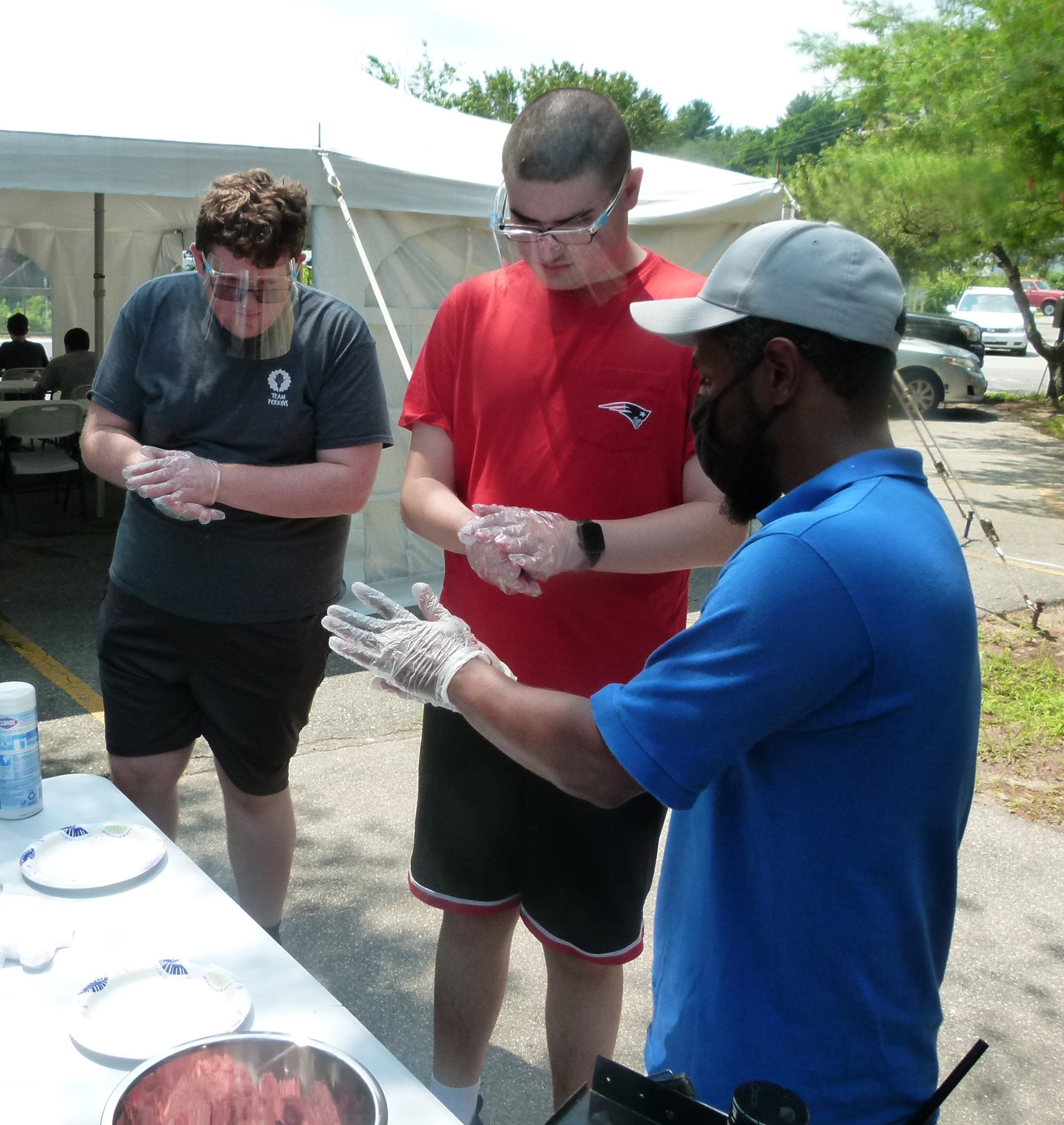 Students learning how to grill